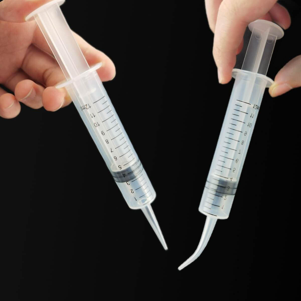 12ml Feeding Syringes with Curved and Straight Tips in Hand